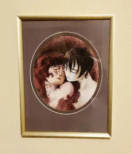 Framed painting for Love and Tranquility hung on a wall.